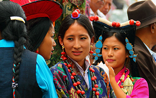 Tibetan women wear colourful traditional dress in Dharamsala